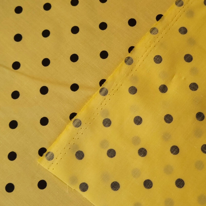 Tela de Batista Amarilla Lunares Negros de 7mm (ancho 1,55M) - Imagen 4