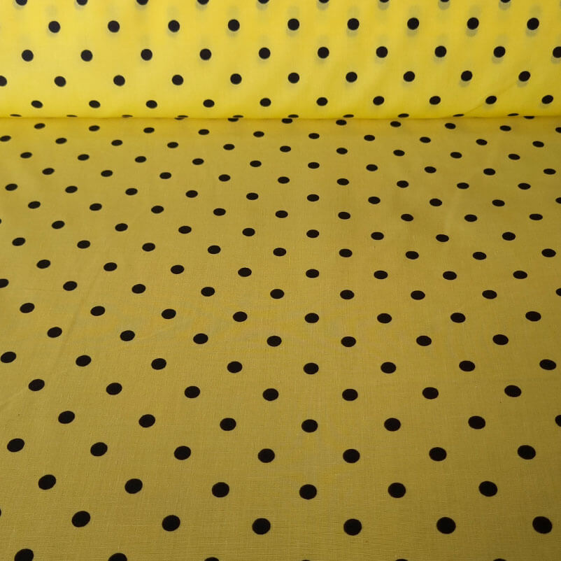 Tela de Batista Amarilla Lunares Negros de 7mm (ancho 1,55M)