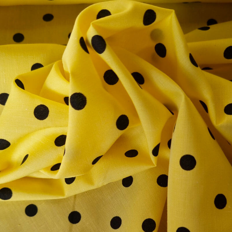 Tela de Batista Amarilla Lunares Negros de 7mm (ancho 1,55M) - Imagen 2