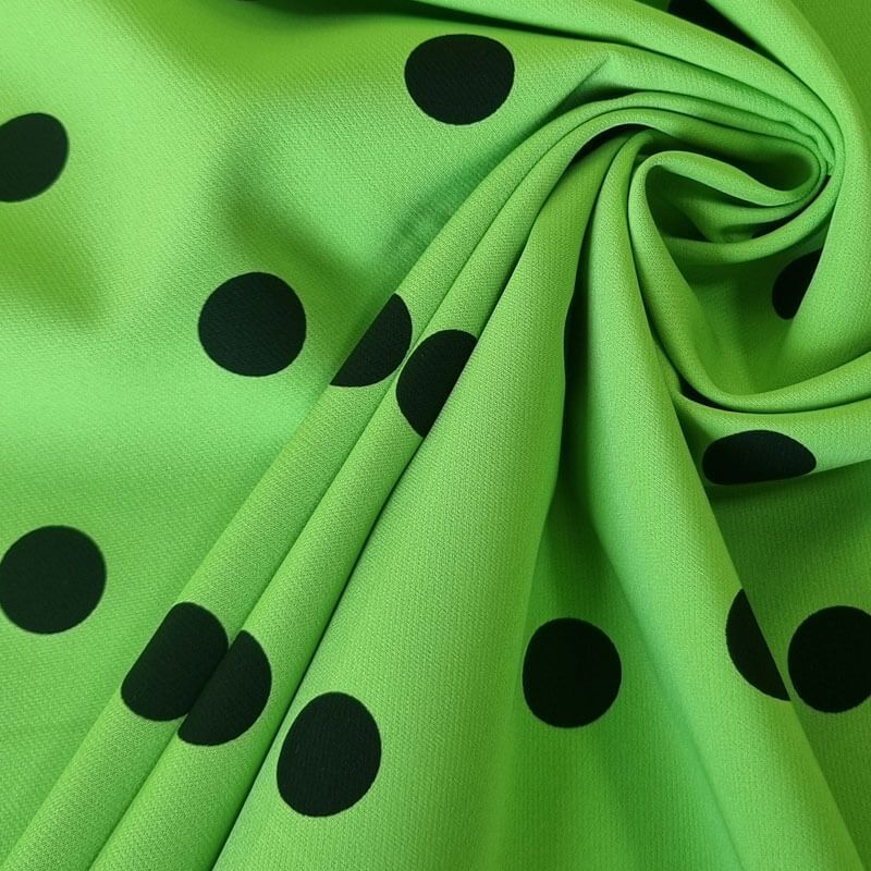 Tela Bielástica Verde Pistacho con Lunares Negros de 2cm (ancho 1,50M) - Imagen 2