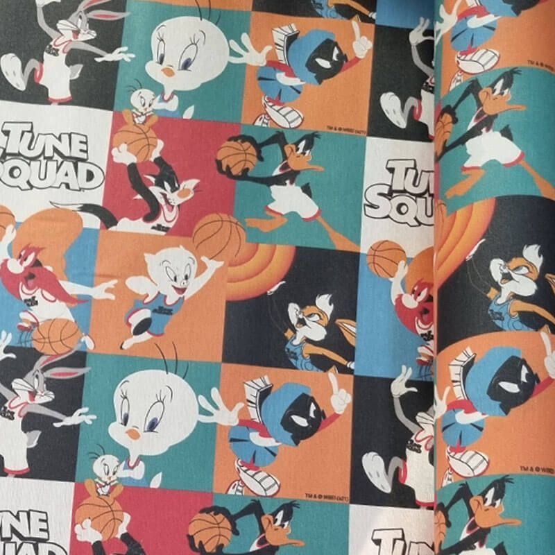 Tela de Mantelería Resinada Antimanchas Tune Squad Multicolor (ancho 1,40M)